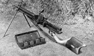 A Japanese Type 11 light machine gun and ammunition box