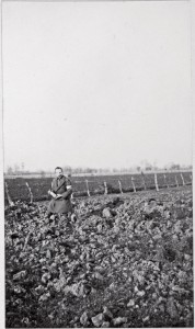 Fred Davidson cradles a spent shell behind the lines at La Boutillerie, south of Armentieres.