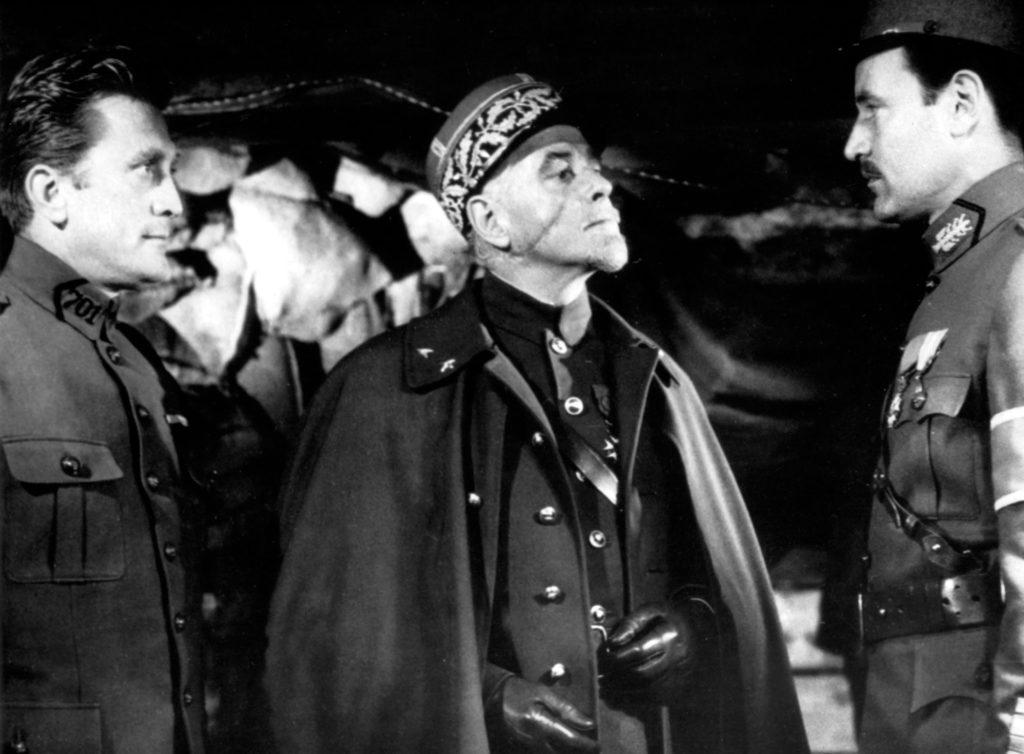 George Macready (centre) as General Mireau. The actor’s slight facial scar was accentuated to give him a more sinister appearance.