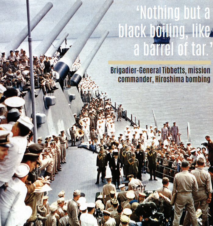 The surrender ceremony: the Japanese delegation arrives on board the USS Missouri, lying at anchor in Tokyo Bay, on 2 September 1945. 