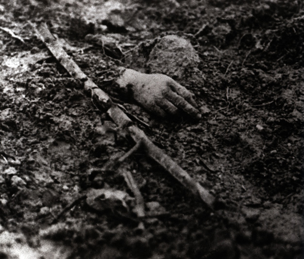 Crouching in muddy trenches and shell-holes brought men into close contact with the dead. The whole battlefield was strewn with human remains.