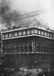 Crowds gather to watch the burning Central Telegraph Office building in St Martin’s-Le-Grand during the 7 July daylight Gotha raid.