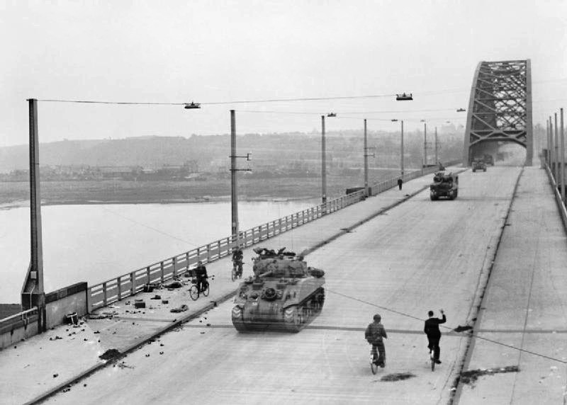 British Shermans cross the bridge at Nijmegen.