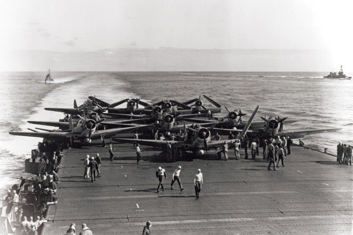 Aircraft are prepared for launching on USS Enterprise  in the early morning, 4 June 1942