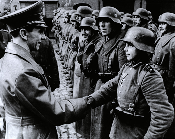 Goebbels inspects some of the last defenders of the Third Reich.