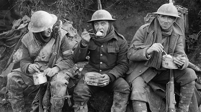 British soldiers eating in the trenches during World War I. Food was extremely difficult to acquire on both sides of the front.