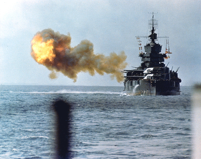 The USS Idaho shells Japanese positions on Okinawa. The US fleet played a key role in providing heavy artillery support to US ground forces.