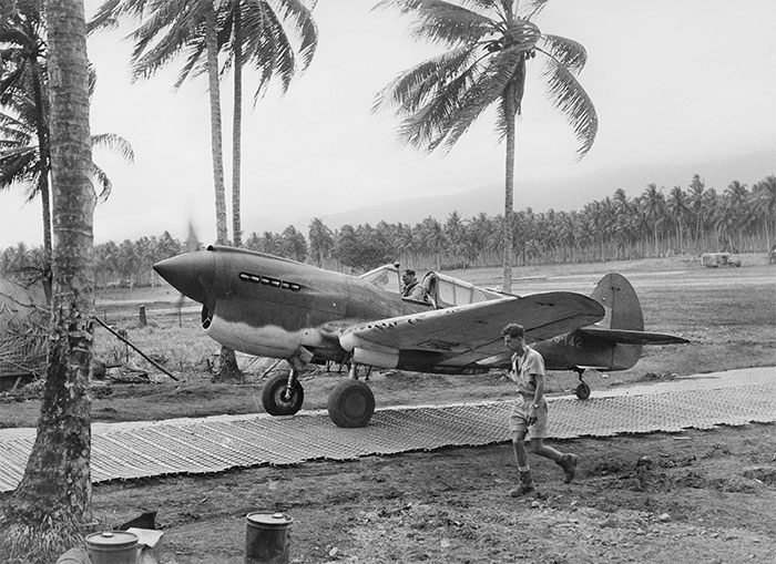 Keith Truscott aboard a P-40 Kittyhawk at Milne Bay, New Guinea, in September 1942. He took part in several crucial and treacherous missions in the Pacific Theatre.