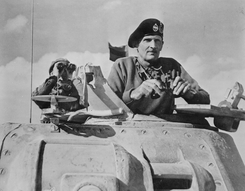 Montgomery watches his tanks move up to the front line at the Second Battle of El Alamein, November 1942.
