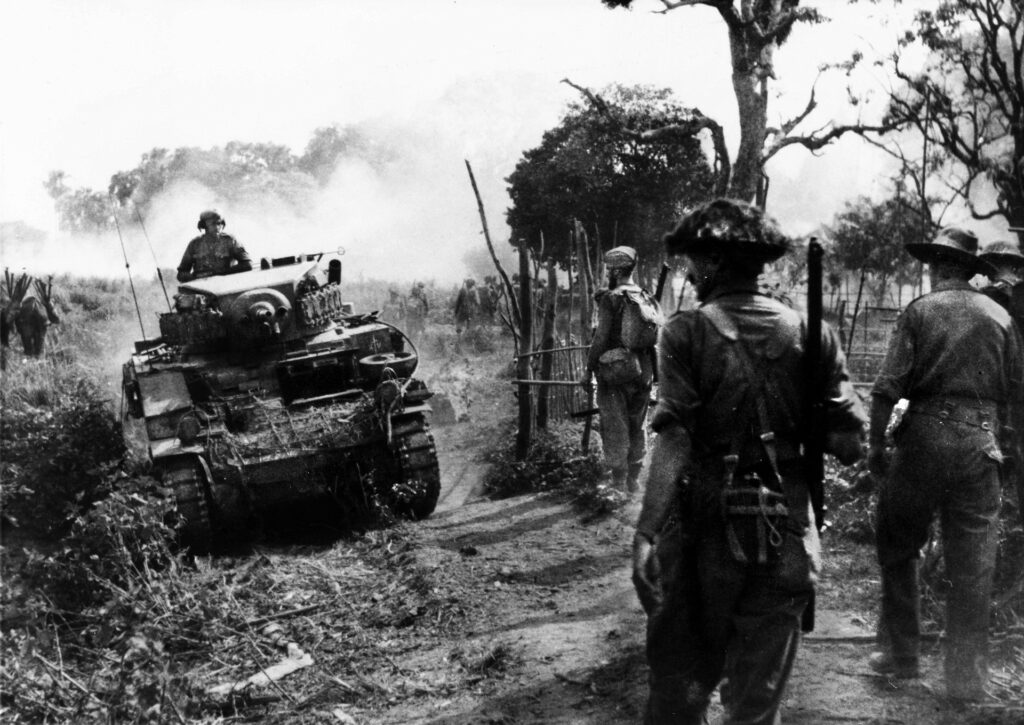 Tanks and infantry of the 19th Indian ‘Dagger’ Division move up to the attack, Burma, c.1944.